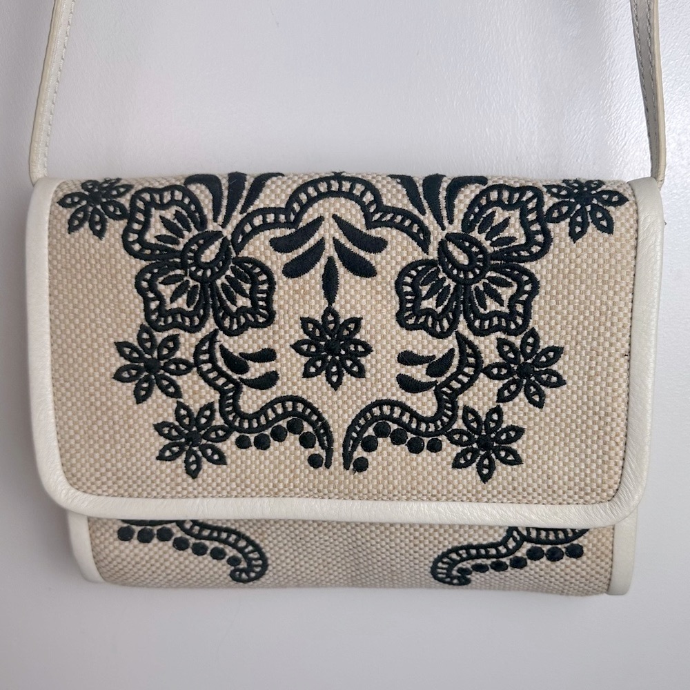 Isabella Fiore Cream Canvas With Black Embroidery Floral Flap Crossbody Purse
